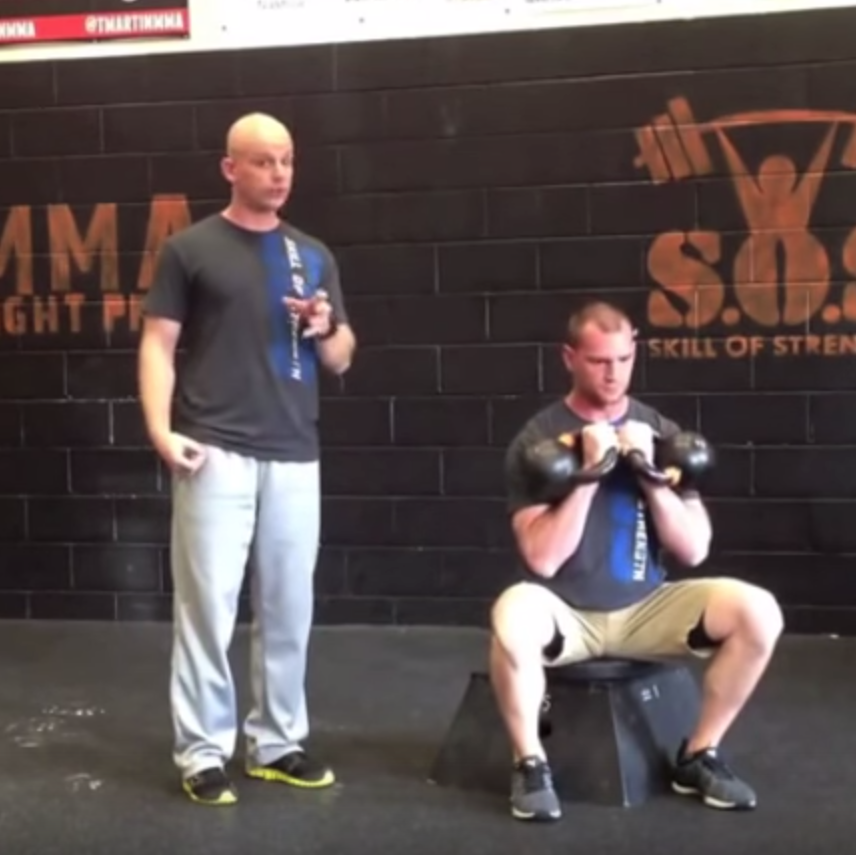 Double Kettlebell Concentric Squat